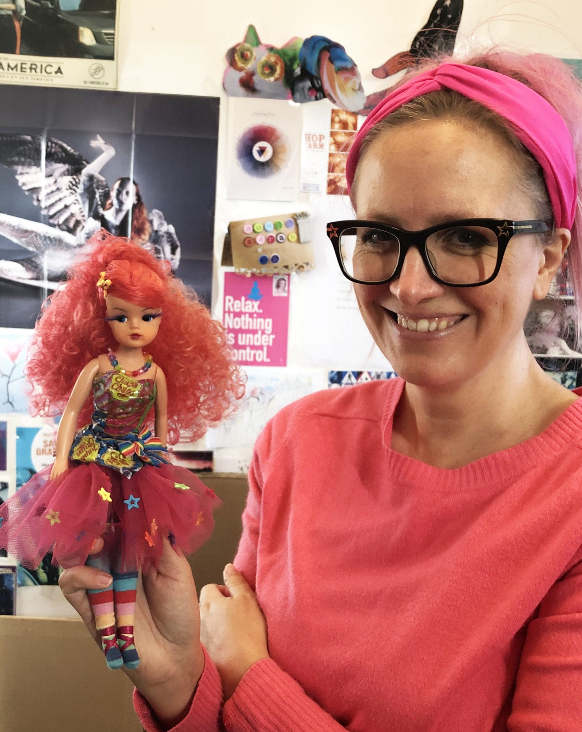 Sarah Graham with a doll made for her by doll designer Rachel Godfrey. Note the Chupa Chup bodice.